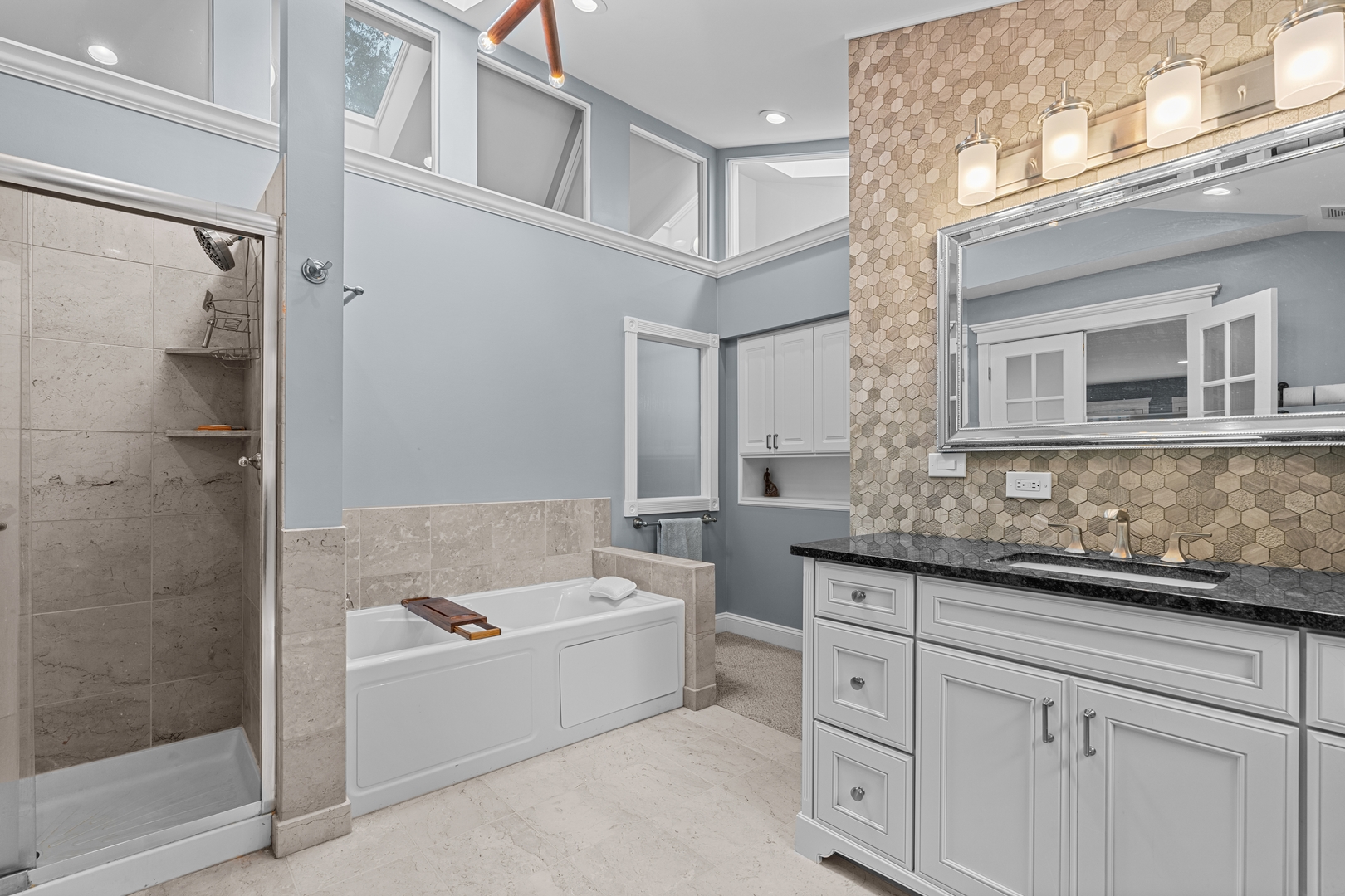 906 Bridle Lane Cary, IL 60013 - Photo 40 of 61 a bathroom with a granite countertop sink mirror and bathtub