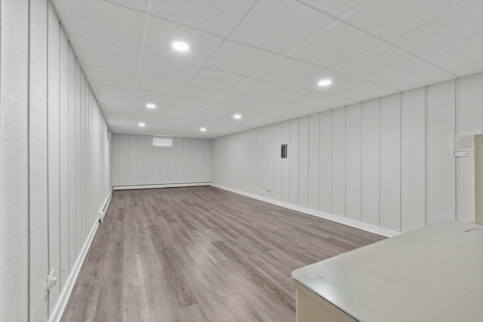 906 Bridle Lane Cary, IL 60013 - Photo 42 of 61 a view of an empty room with wooden floor