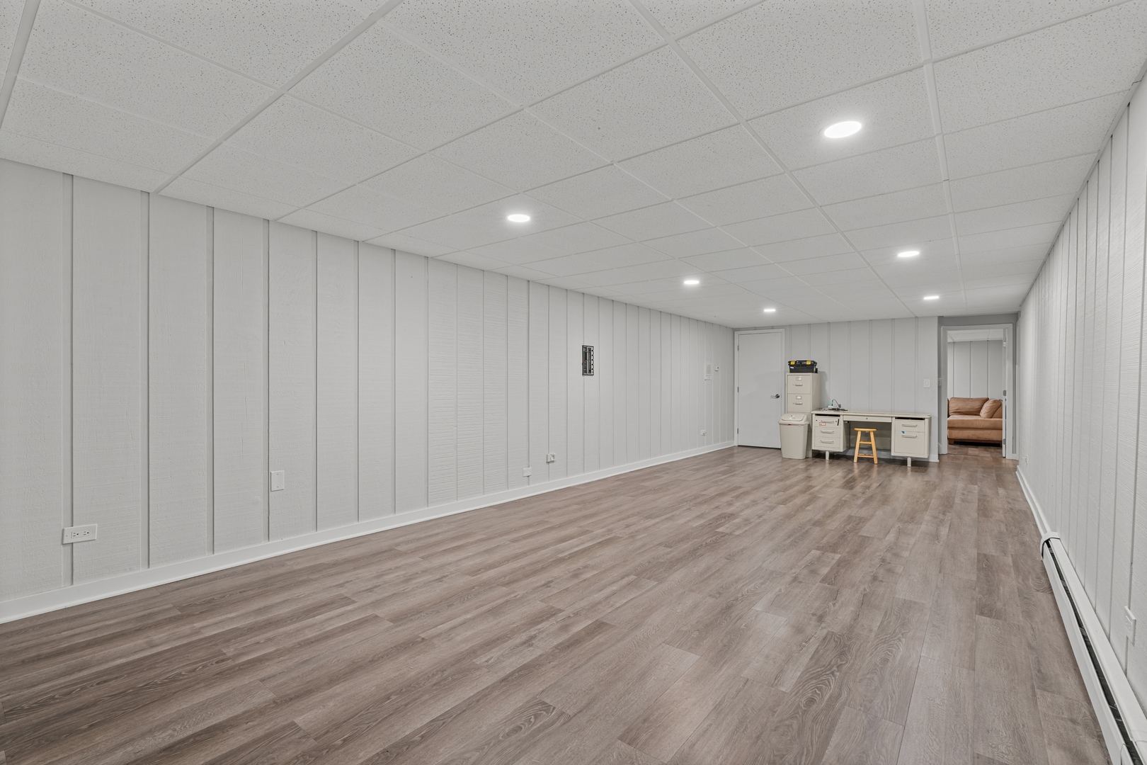 906 Bridle Lane Cary, IL 60013 - Photo 43 of 61 a view of empty room with wooden floor