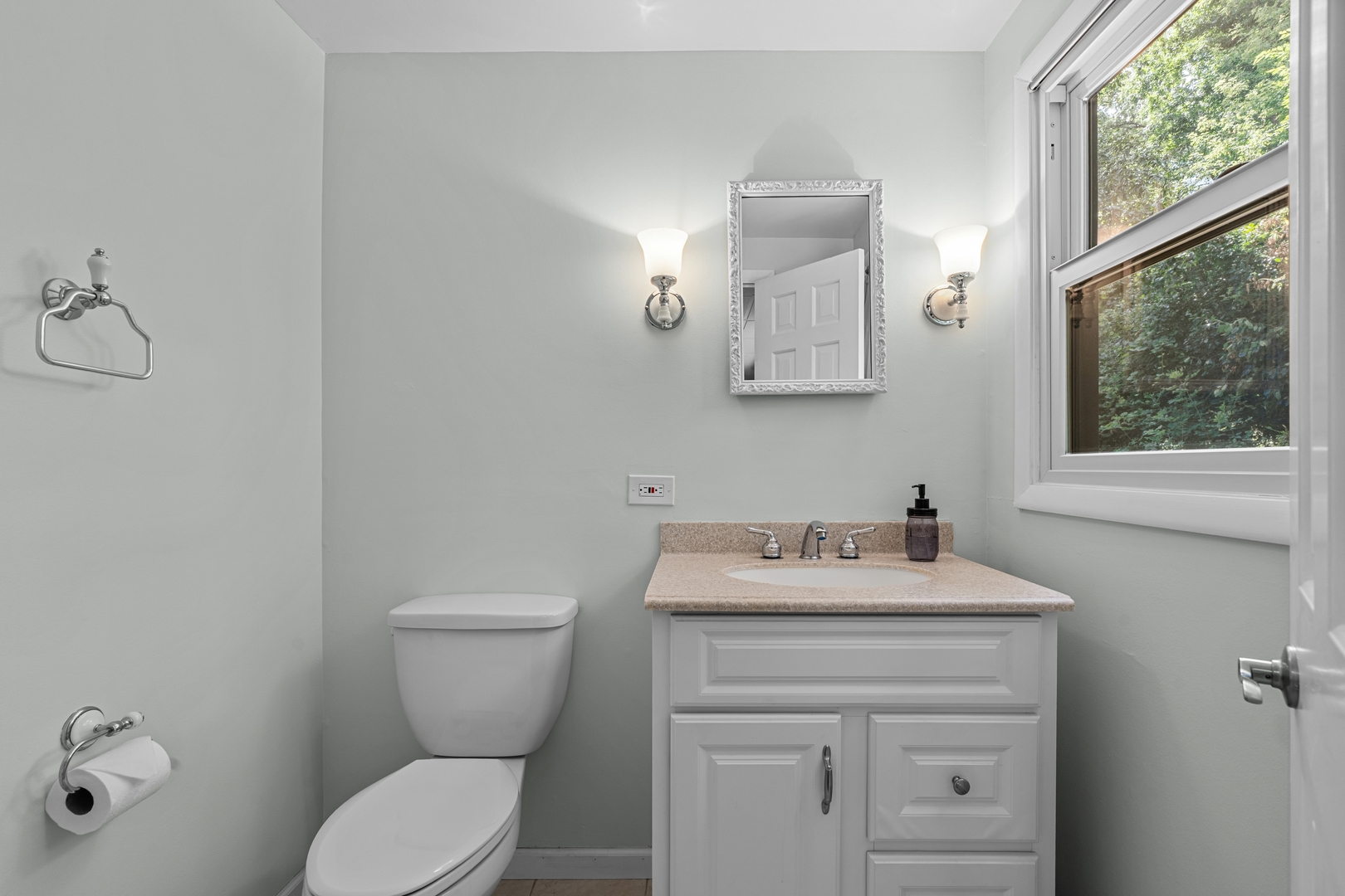 906 Bridle Lane Cary, IL 60013 - Photo 46 of 61 a bathroom with a sink toilet and a mirror