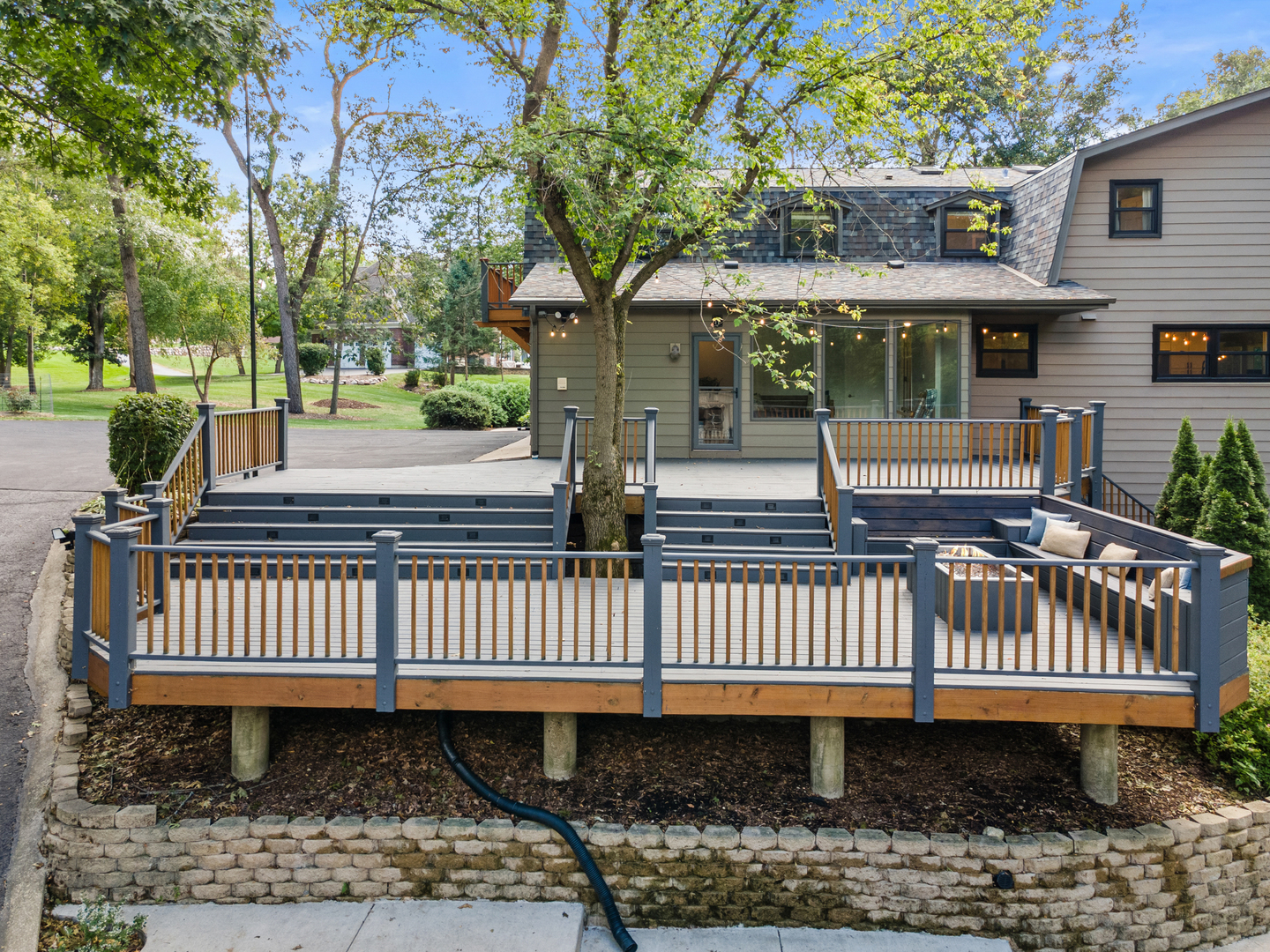 906 Bridle Lane Cary, IL 60013 - Photo 7 of 61 a view of a deck with a yard and furniture