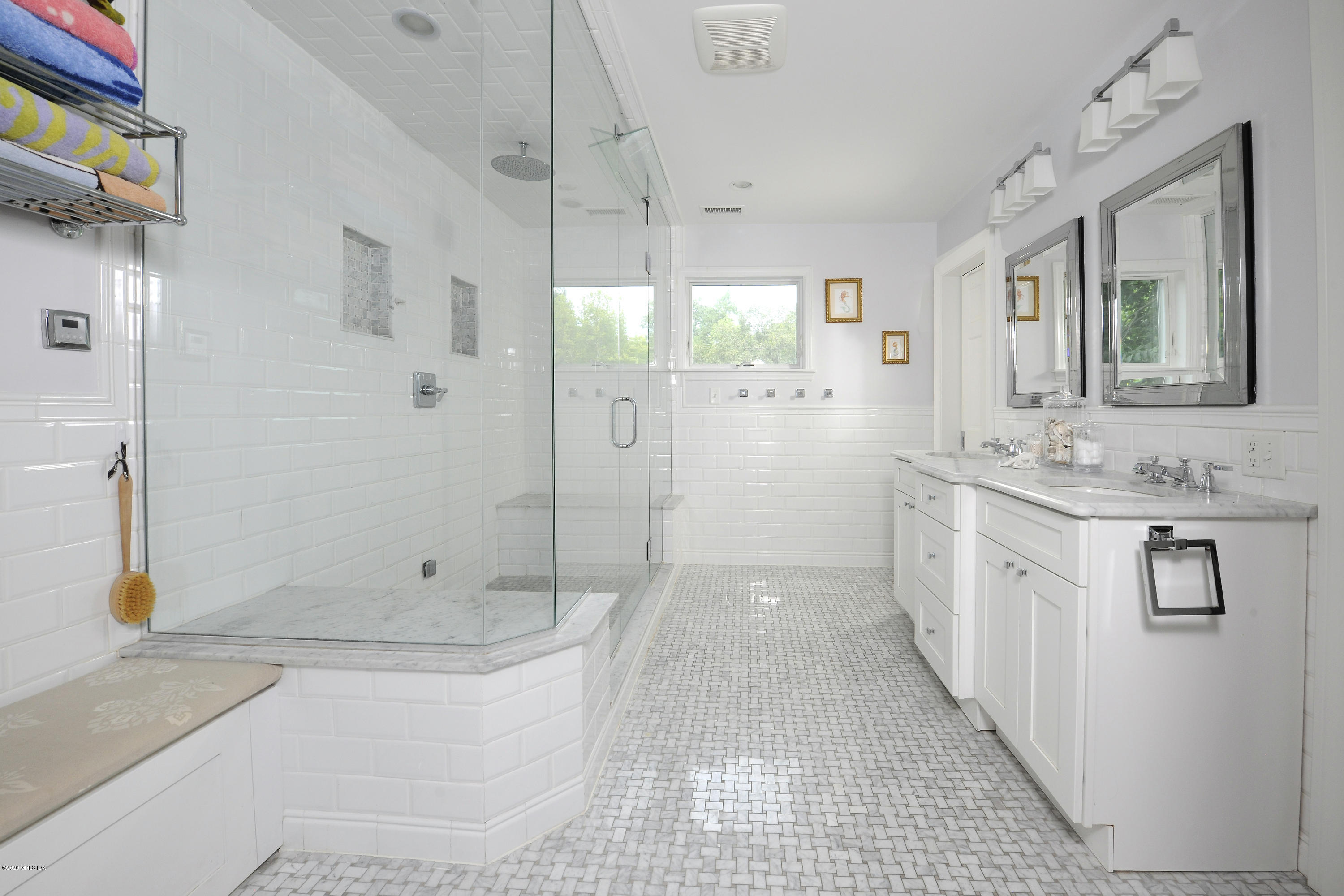 19 Gregory Road Cos Cob, CT 06807 - Photo 14 of 22 a bathroom with a granite countertop sink a toilet a mirror and shower