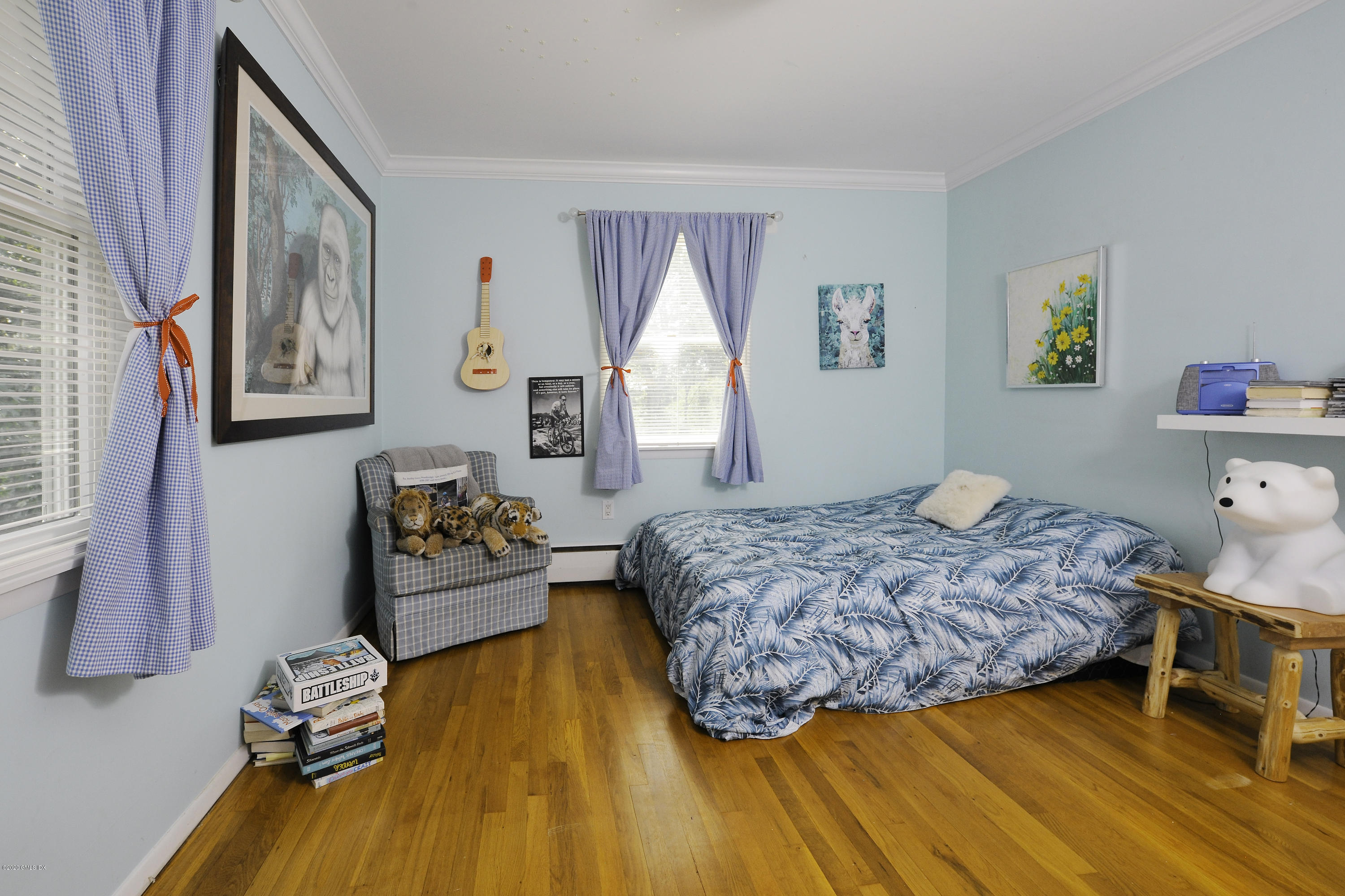 19 Gregory Road Cos Cob, CT 06807 - Photo 17 of 22 a bedroom with a bed and a window