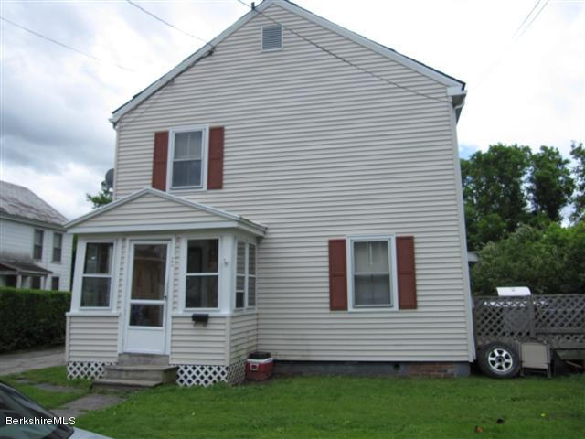 131-135 Protection Avenue North Adams, MA 01247 - Photo 2 of 5 a front view of a house with a yard