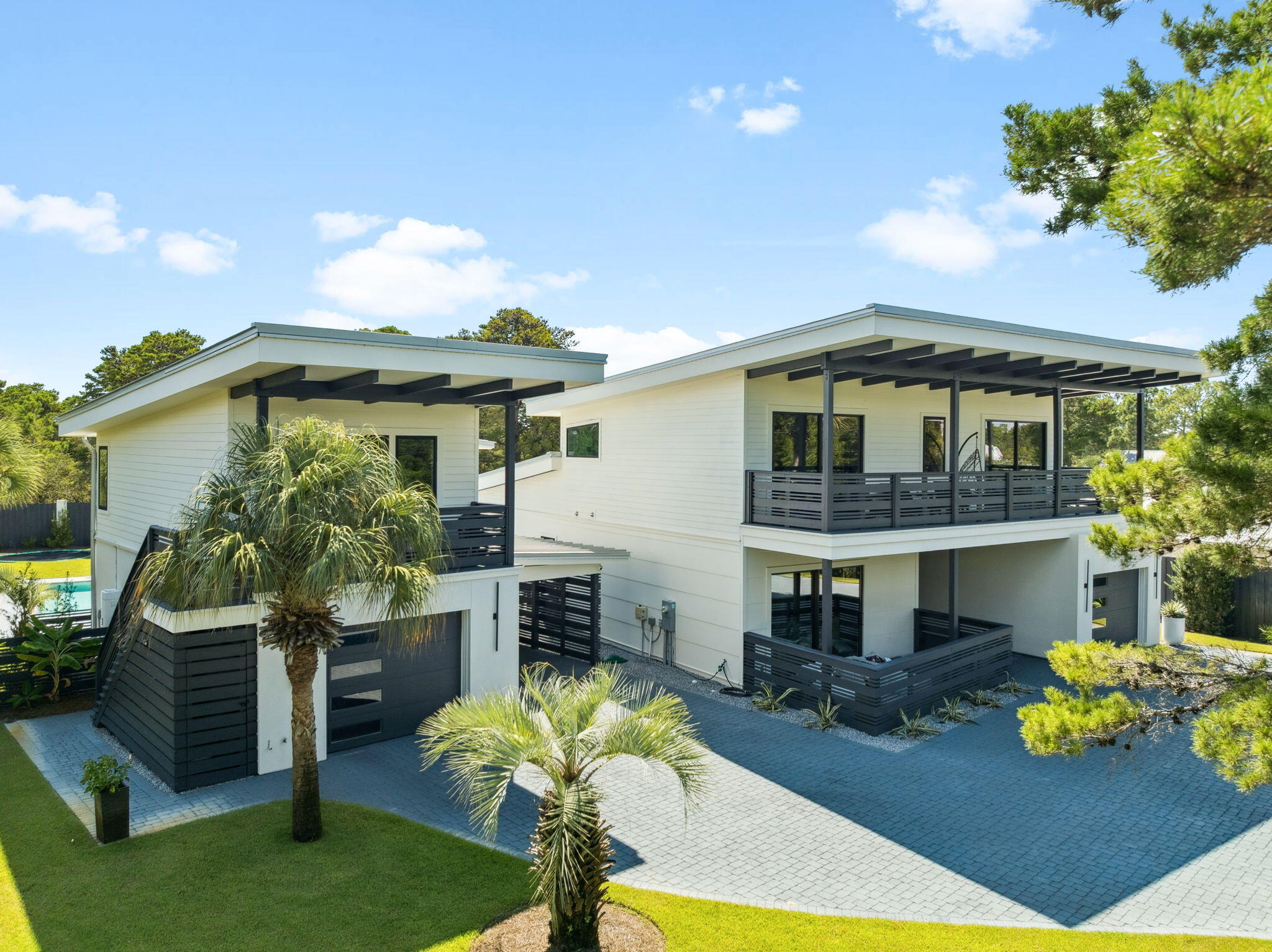 114 Surfside Drive Santa Rosa Beach, FL 32459 - Photo 2 of 45 a front view of house with yard and outdoor seating
