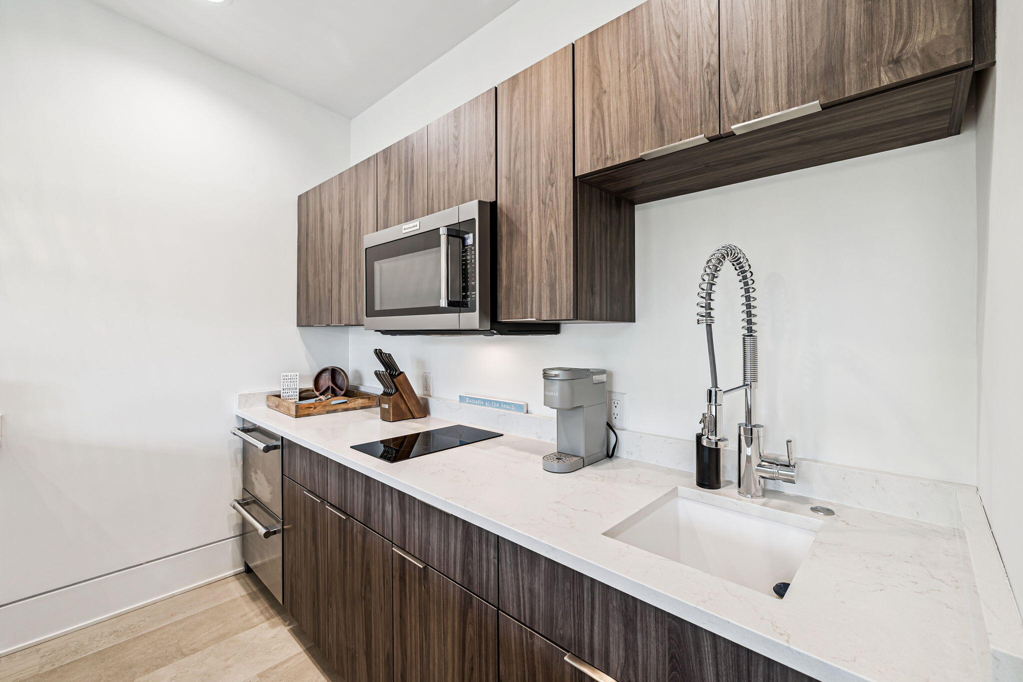 114 Surfside Drive Santa Rosa Beach, FL 32459 - Photo 38 of 45 a kitchen with a sink cabinets and appliances