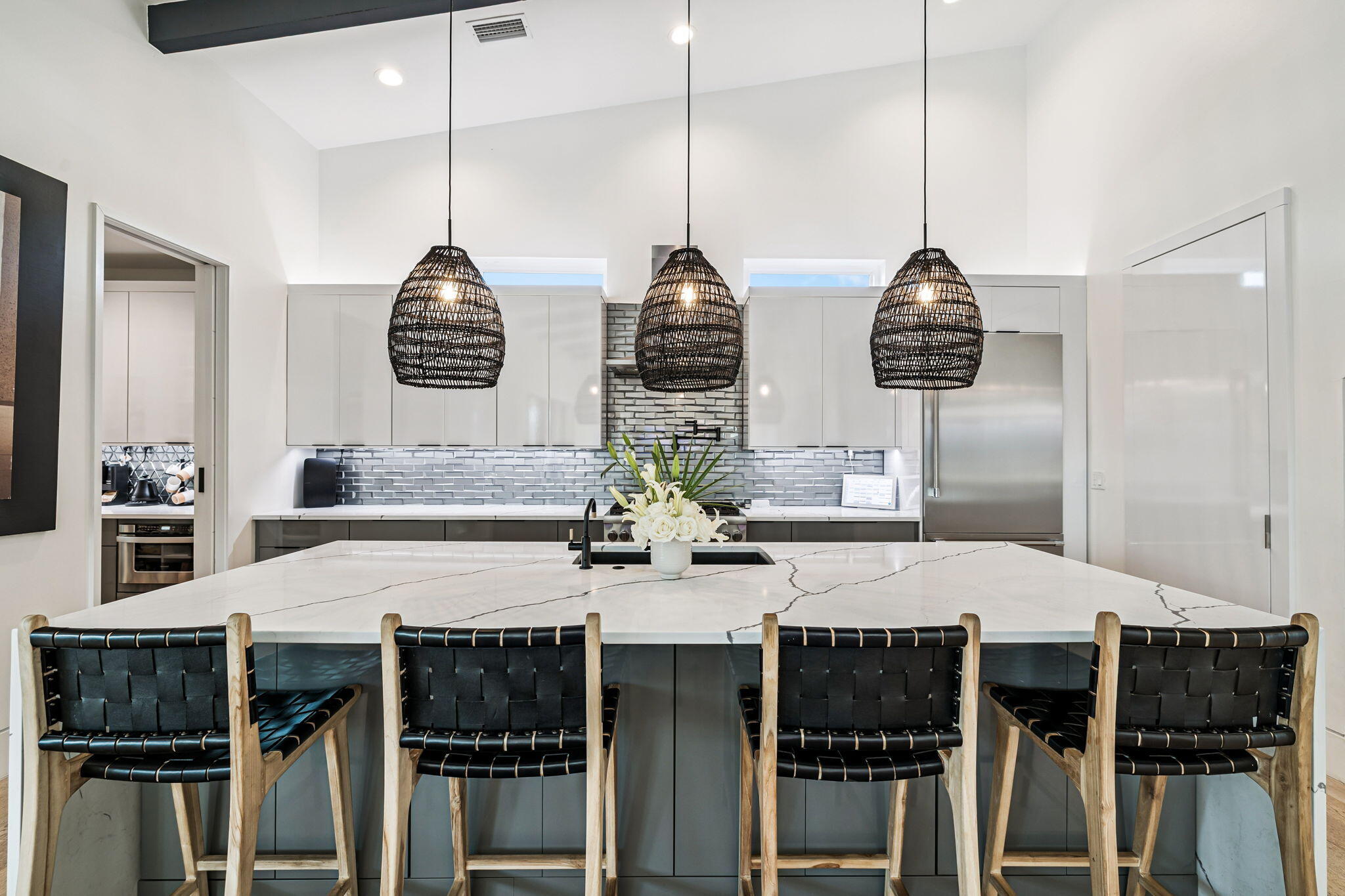 114 Surfside Drive Santa Rosa Beach, FL 32459 - Photo 7 of 45 a kitchen with a counter and chairs