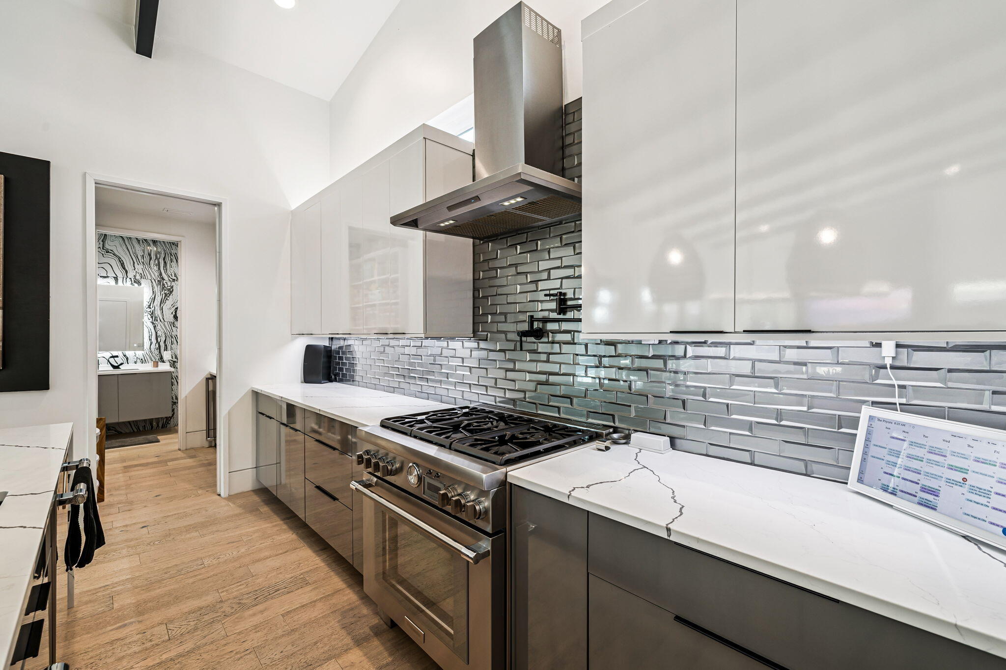 114 Surfside Drive Santa Rosa Beach, FL 32459 - Photo 8 of 45 a kitchen with a stove and a wooden floor