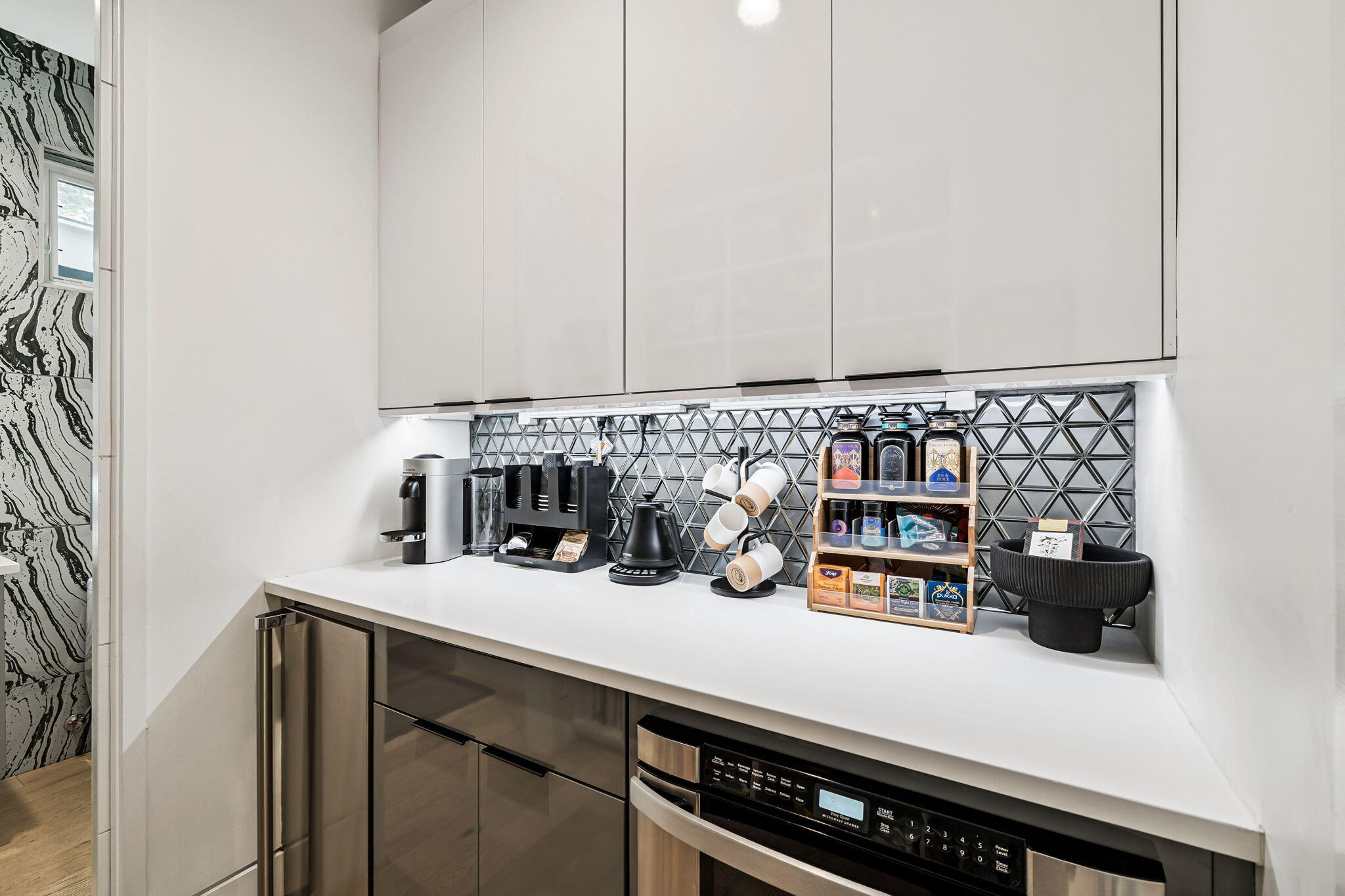 114 Surfside Drive Santa Rosa Beach, FL 32459 - Photo 9 of 45 a kitchen with a sink a stove and cabinets