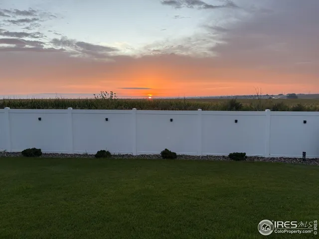 a view of a big yard with an outdoor space