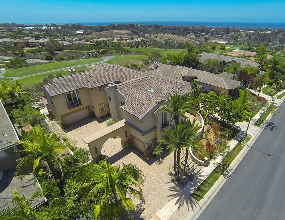 1445 Ravean Court Encinitas, CA 92024 - Photo 2 of 25 Set on a hill this 5,001 SF home in exclusive Quail Ranch is close to the beach, great downtown Encinitas shops and restaurants, as well as easy access to the freeway.