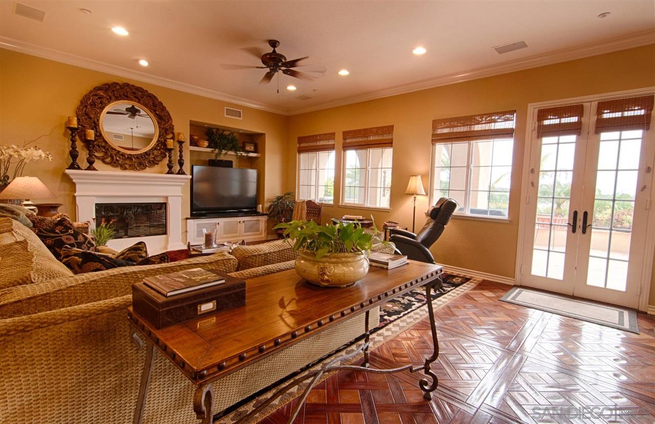 1445 Ravean Court Encinitas, CA 92024 - Photo 6 of 25 Large family room opens to kitchen and gorgeous backyard.