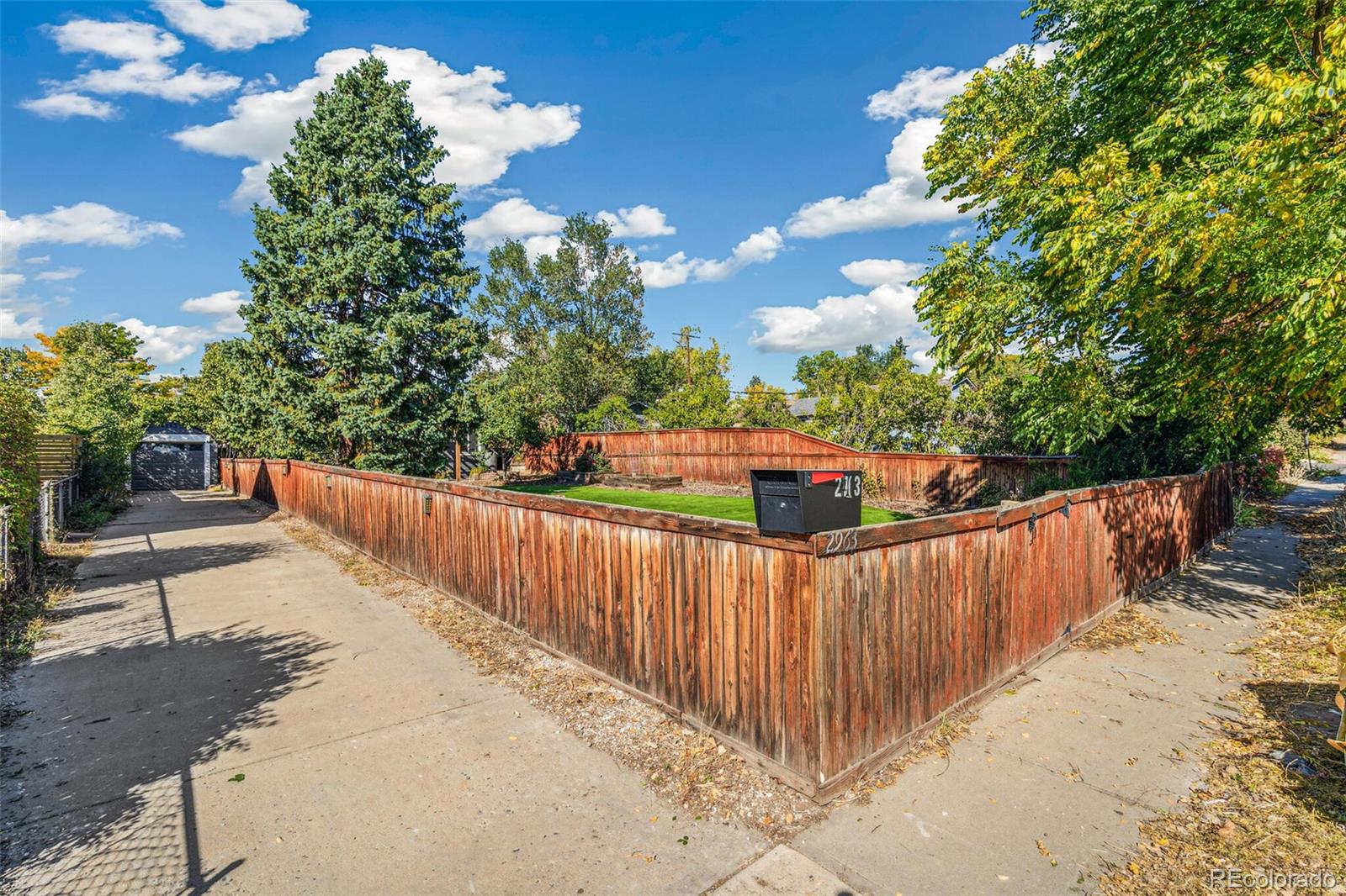 2963 Ames Street Wheat Ridge, CO 80214 - Photo 24 of 24 a balcony with wooden fence