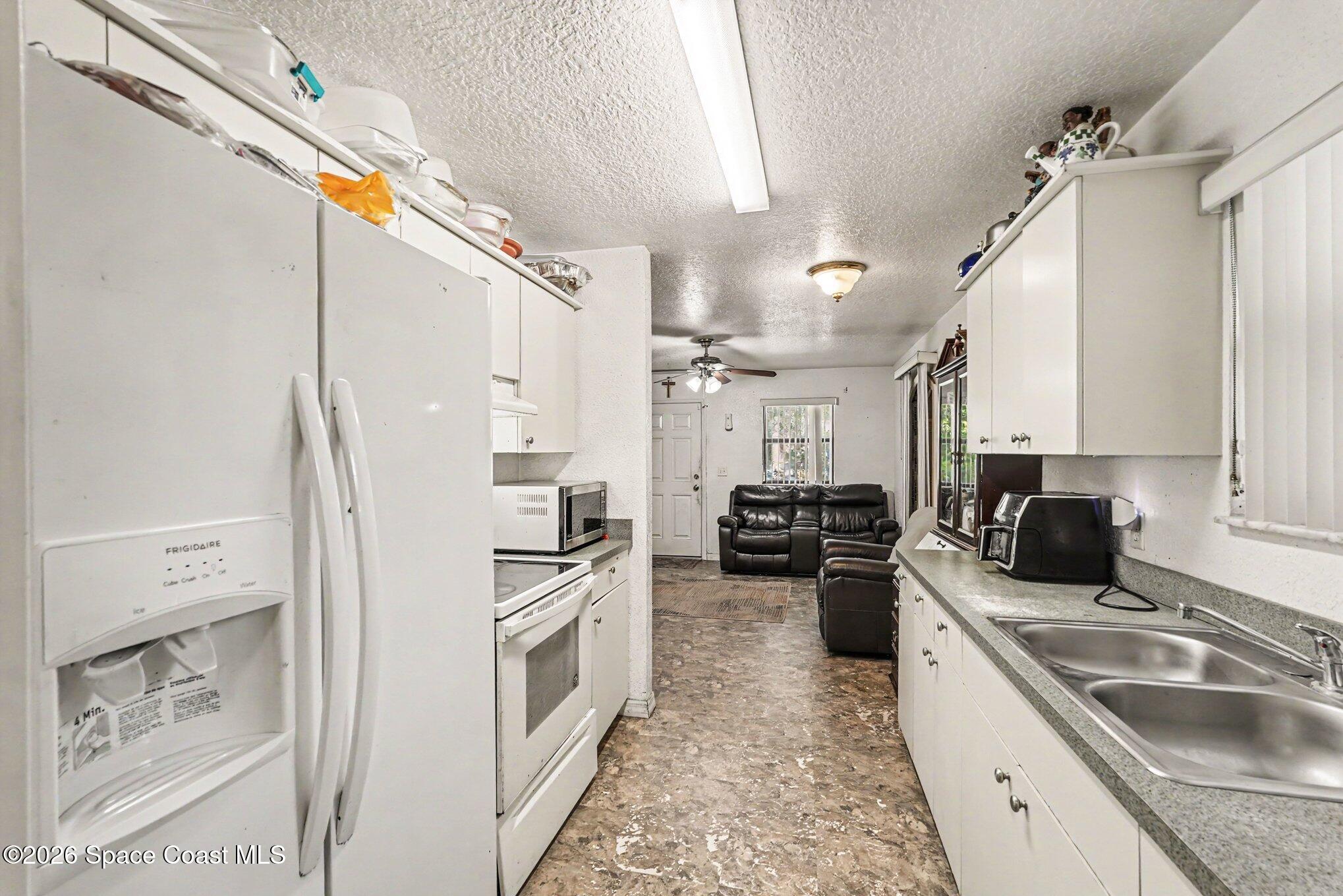 2225 Monroe Street Palm Bay, FL 32905 - Photo 9 of 28 011_file_9457