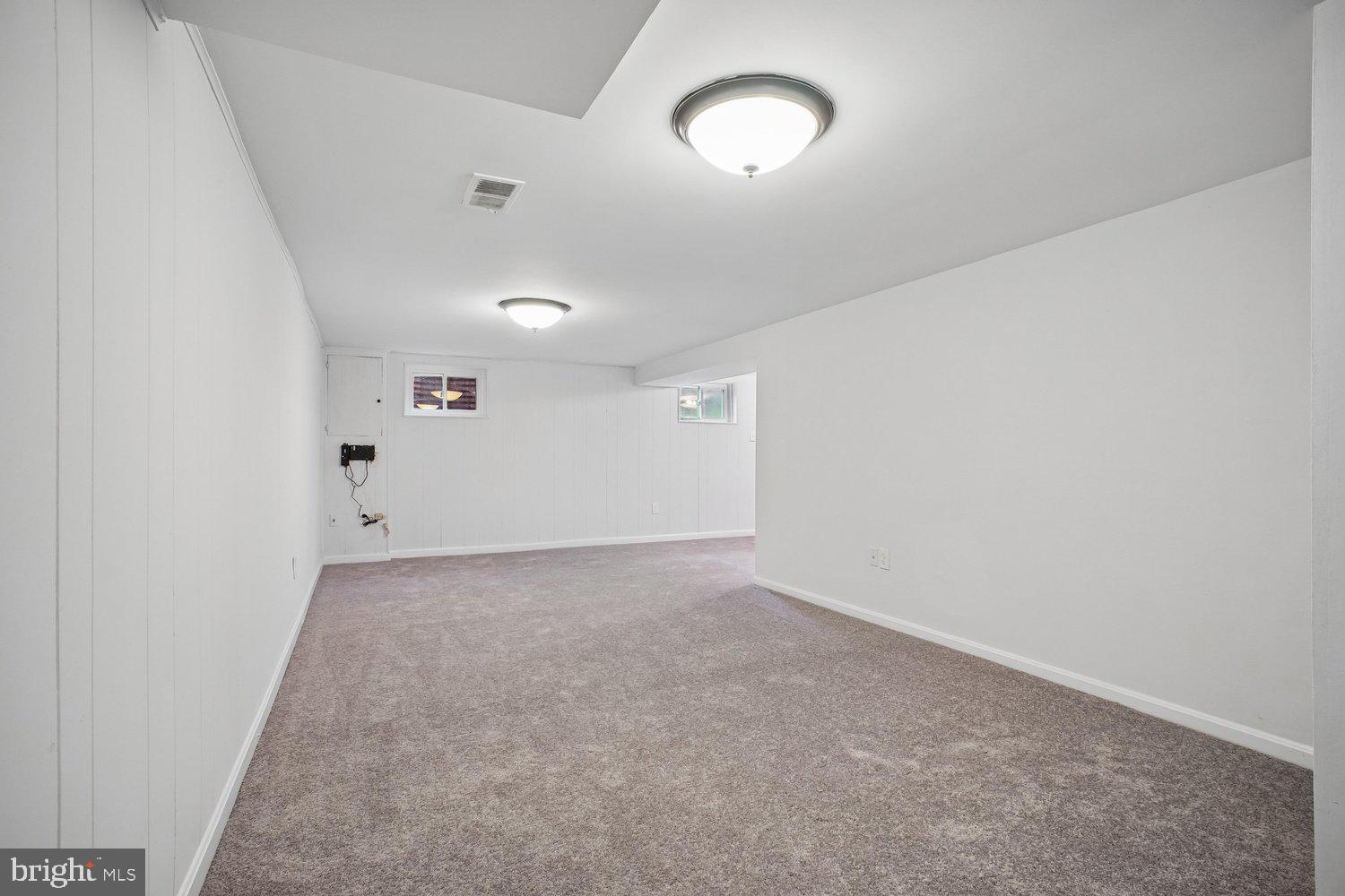 8933 Burke Lake Road Springfield, VA 22151 - Photo 36 of 47 New Plush Carpeting in Lower Level Rec Room