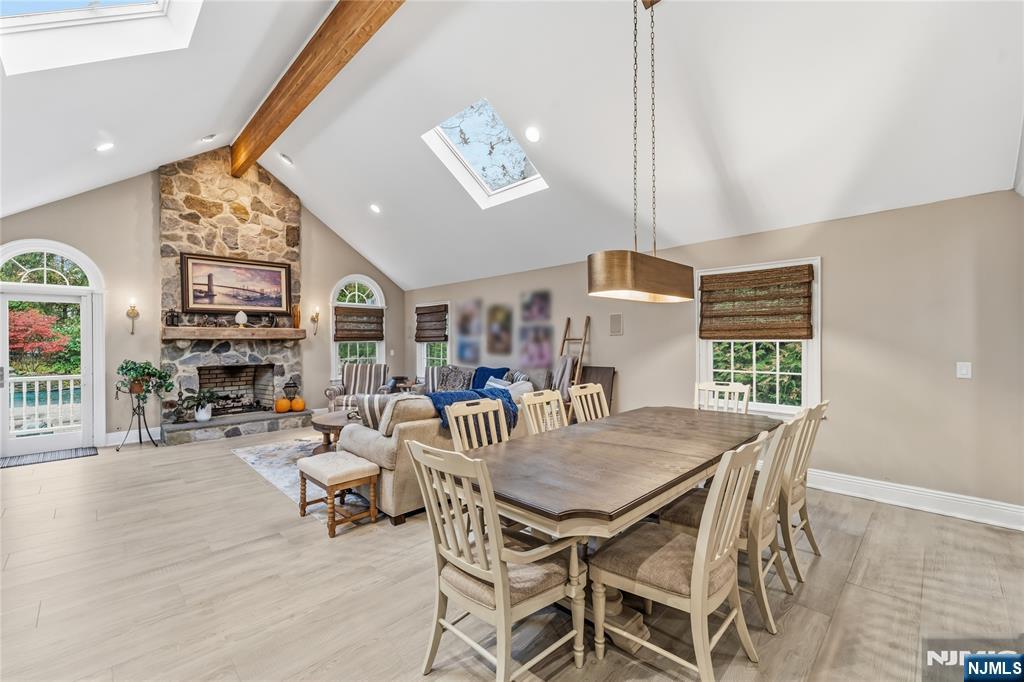 854 Cambridge Road River Vale, NJ 07675 - Photo 14 of 50 a view of a dining room with furniture window and wooden floor