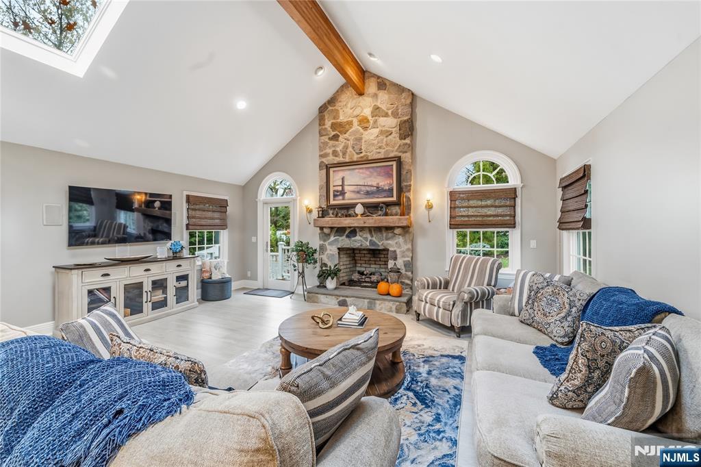 854 Cambridge Road River Vale, NJ 07675 - Photo 19 of 50 a living room with furniture and a flat screen tv