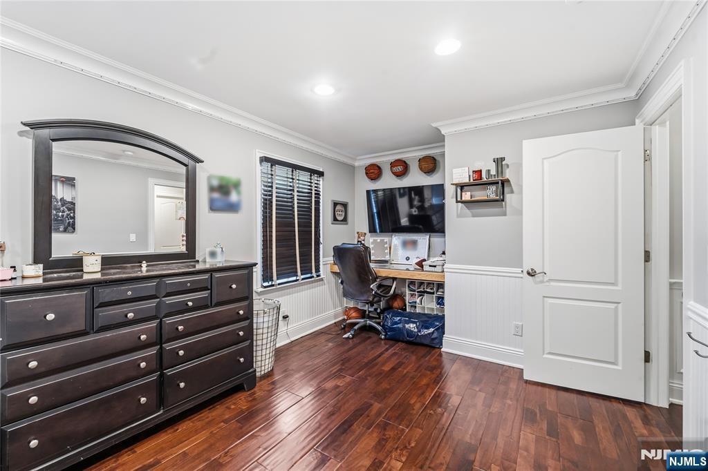854 Cambridge Road River Vale, NJ 07675 - Photo 24 of 50 a view of a livingroom with furniture and a flat screen tv