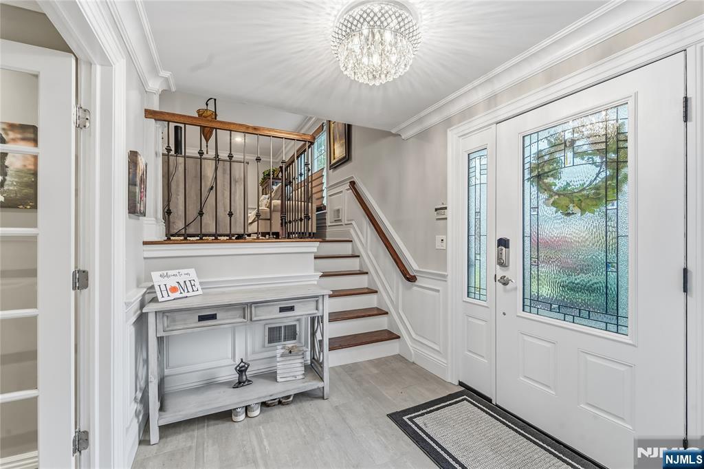 854 Cambridge Road River Vale, NJ 07675 - Photo 4 of 50 a view of entryway and hall with wooden floor