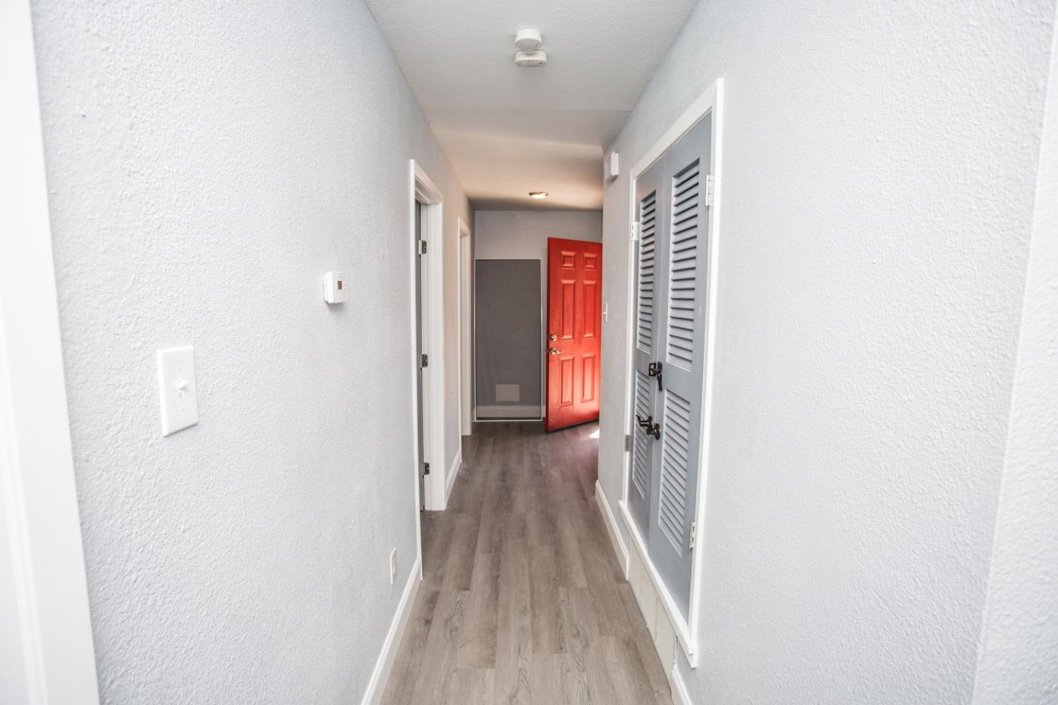 4804 44th Street Lubbock, TX 79414 - Photo 28 of 32 a view of hallway with wooden floor