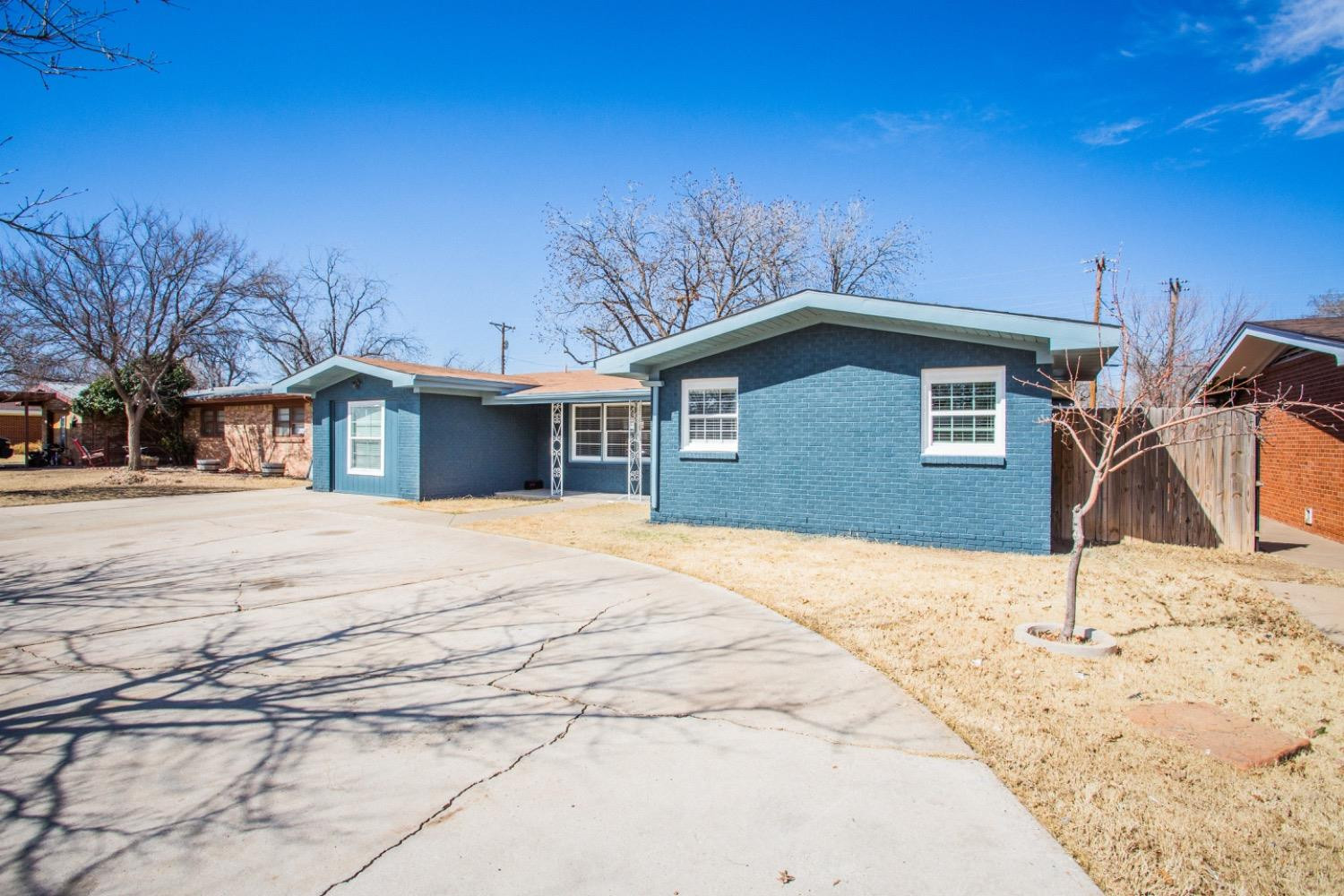 4804 44th Street Lubbock, TX 79414 - Photo 3 of 32 a house with a outdoor space