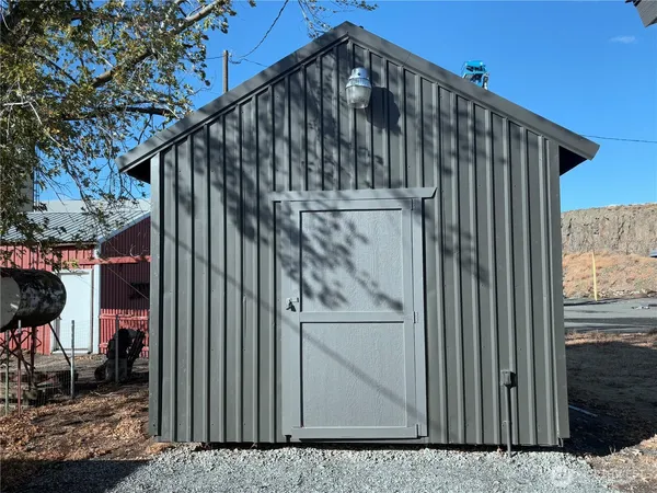 a view of a house with a small yard