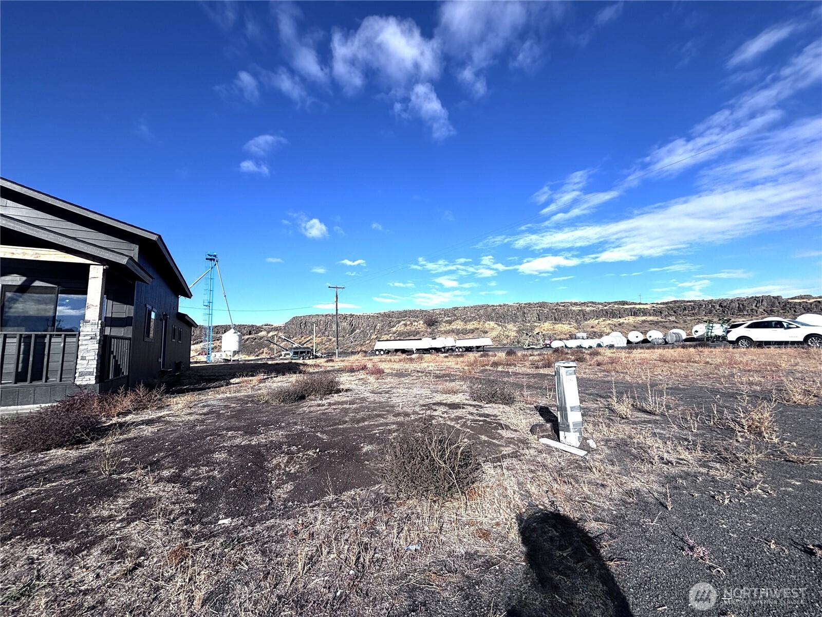 207 North Birch Street Odessa, WA 99159 - Photo 5 of 28 a view of a road with a building in the background