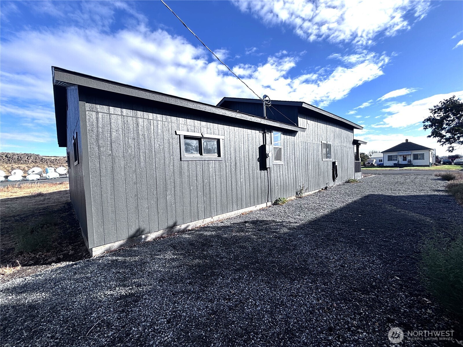 207 North Birch Street Odessa, WA 99159 - Photo 6 of 28 a house view with a backyard space