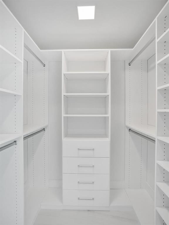 900 North Ocean Boulevard, Unit 1405 Pompano Beach, FL 33062 - Photo 23 of 67 a view of walk in closet with empty racks
