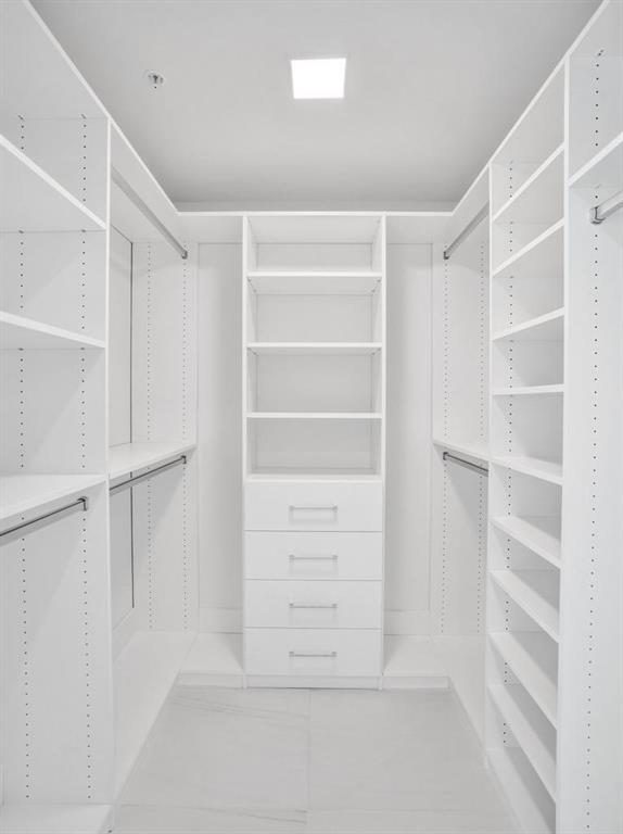 900 North Ocean Boulevard, Unit 1405 Pompano Beach, FL 33062 - Photo 24 of 67 a view of walk in closet with empty racks