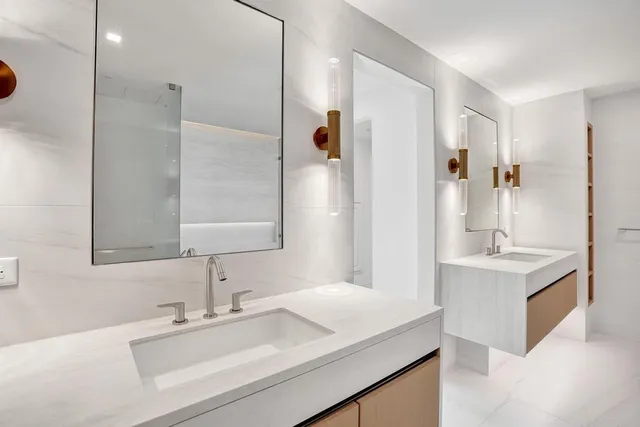 a view of a room with ceiling fan