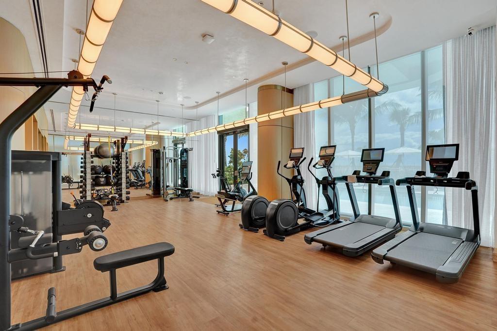 900 North Ocean Boulevard, Unit 1405 Pompano Beach, FL 33062 - Photo 50 of 67 a view of a room with gym equipment