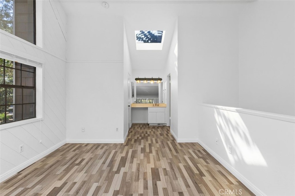 37 Lakepines Irvine, CA 92620 - Photo 17 of 55 a view of a hallway view with wooden floor and staircase