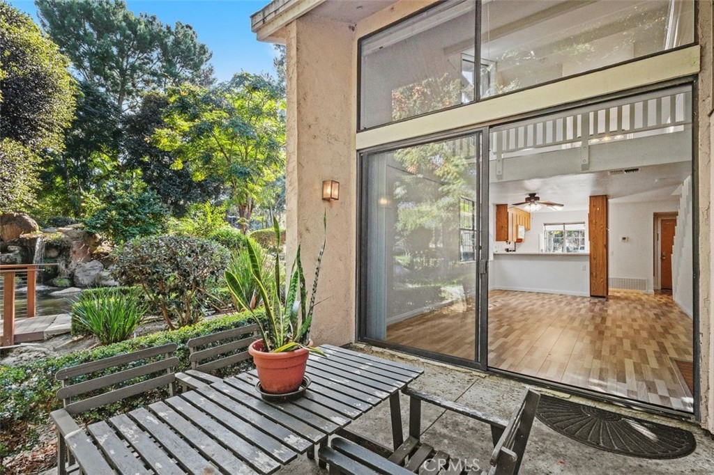 37 Lakepines Irvine, CA 92620 - Photo 25 of 55 Rear patio with view of lakes