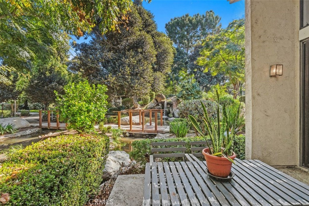 37 Lakepines Irvine, CA 92620 - Photo 27 of 55 a backyard of a house with lots of green space