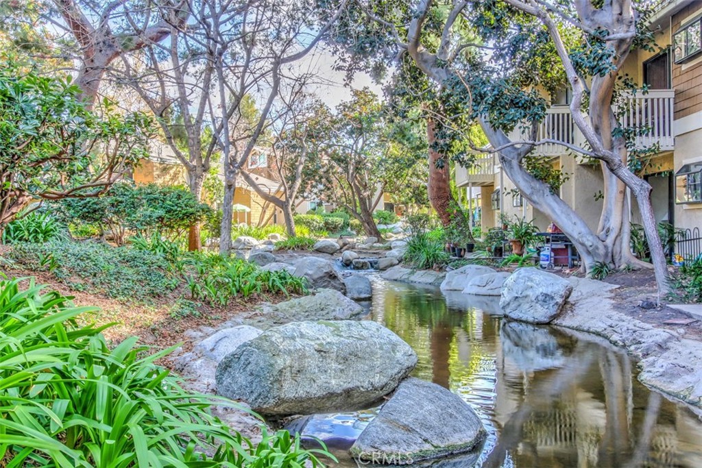 37 Lakepines Irvine, CA 92620 - Photo 33 of 55 a view of a backyard with plants and a patio