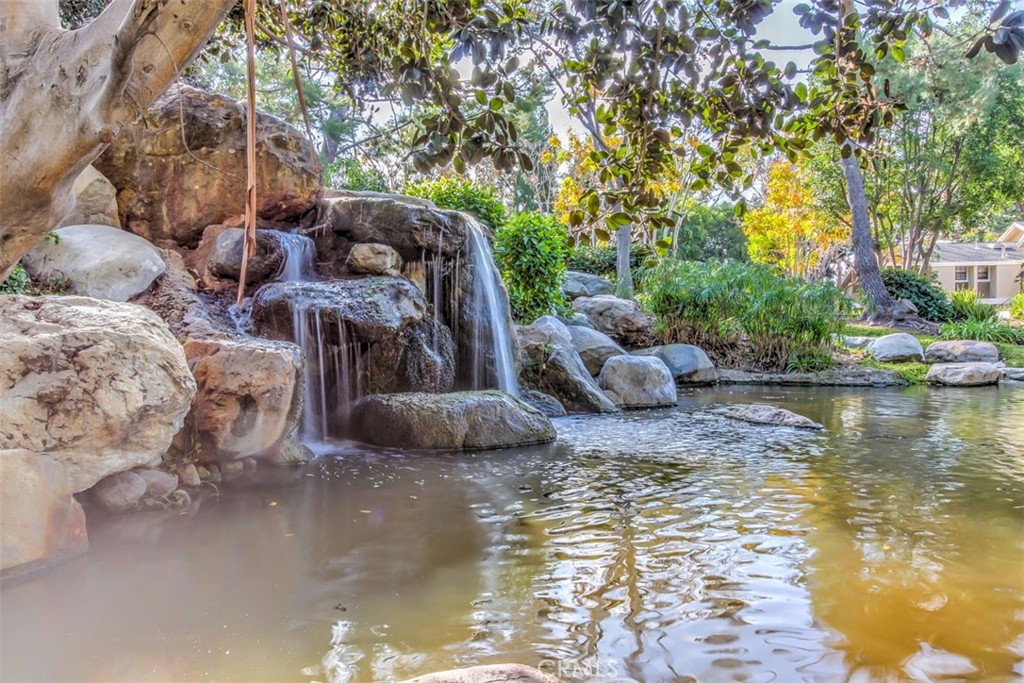 37 Lakepines Irvine, CA 92620 - Photo 36 of 55 a view of a lake with furniture