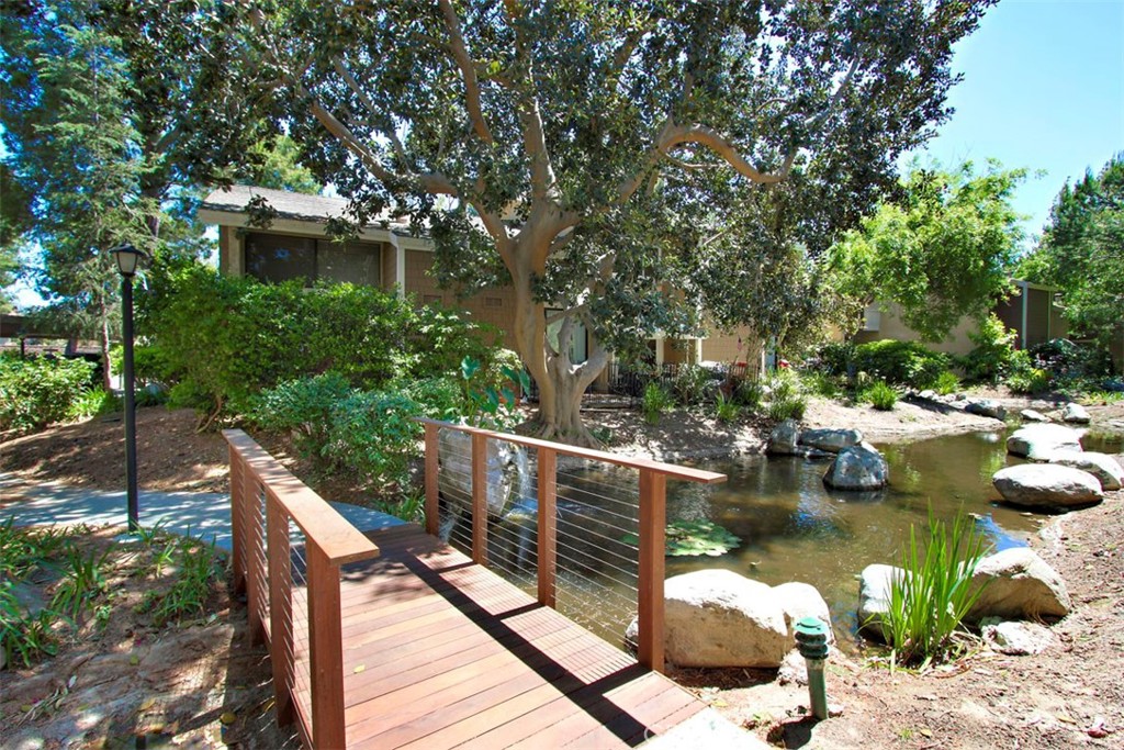 37 Lakepines Irvine, CA 92620 - Photo 38 of 55 a view of a wooden floor and lake
