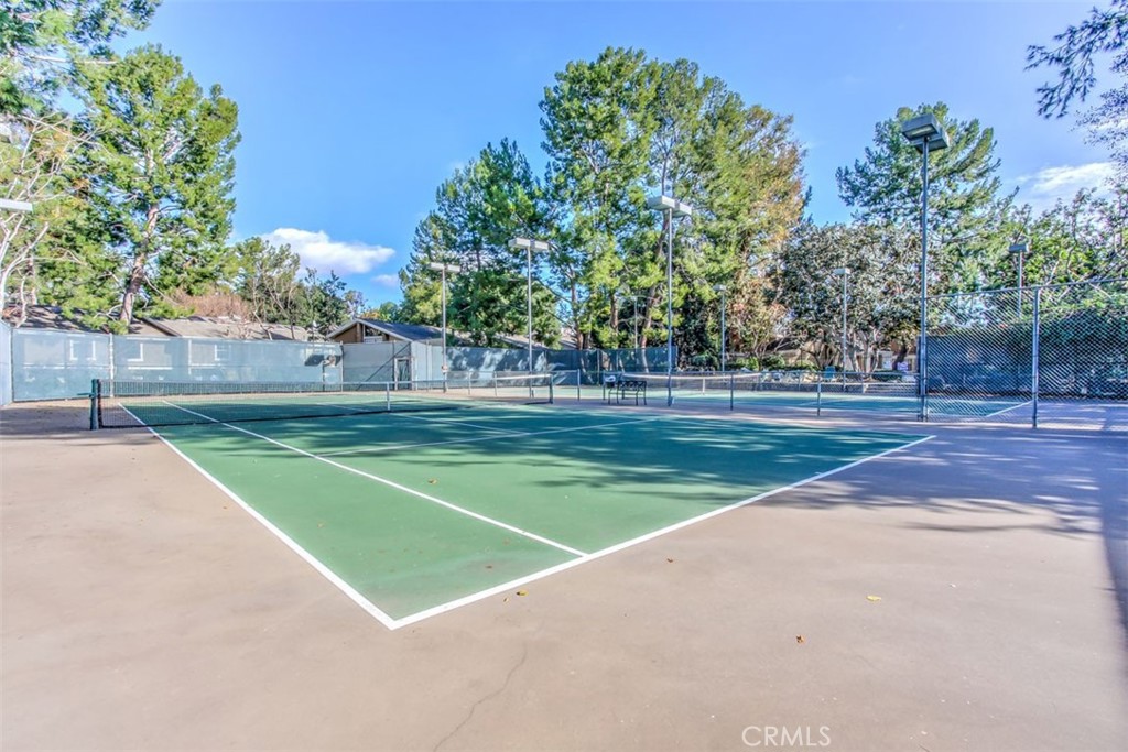 37 Lakepines Irvine, CA 92620 - Photo 39 of 55 a view of a tennis ground with large trees