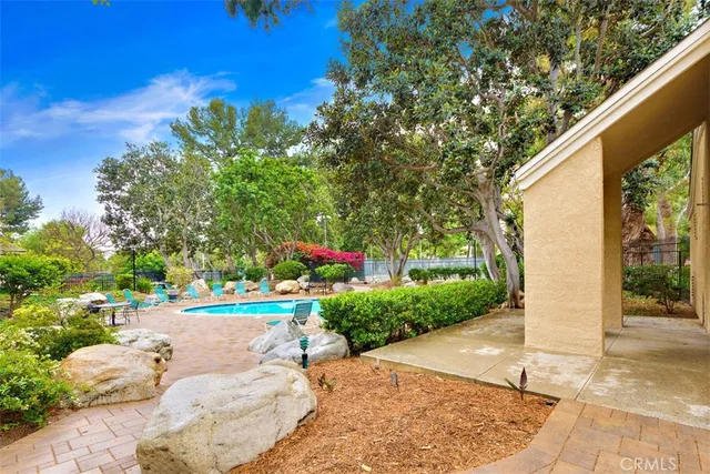 a front view of house with yard and outdoor seating