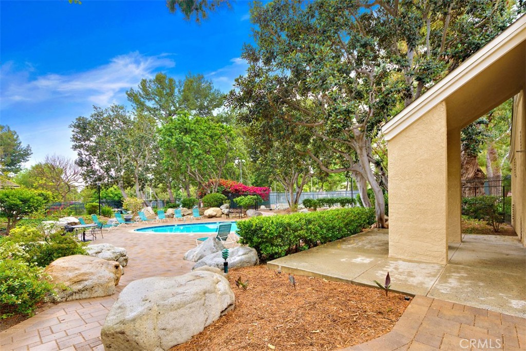 37 Lakepines Irvine, CA 92620 - Photo 44 of 55 a view of a back yard of the house