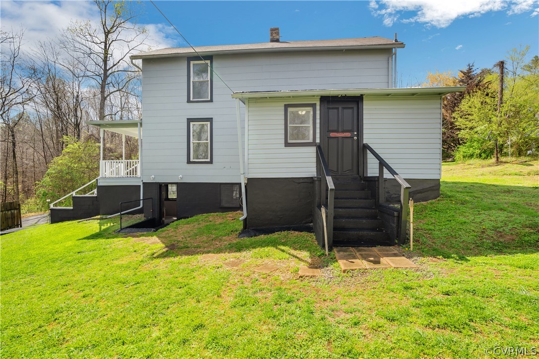 381 Moses Mill Road Chatham, VA 24531 - Photo 2 of 31 a house view with a garden space