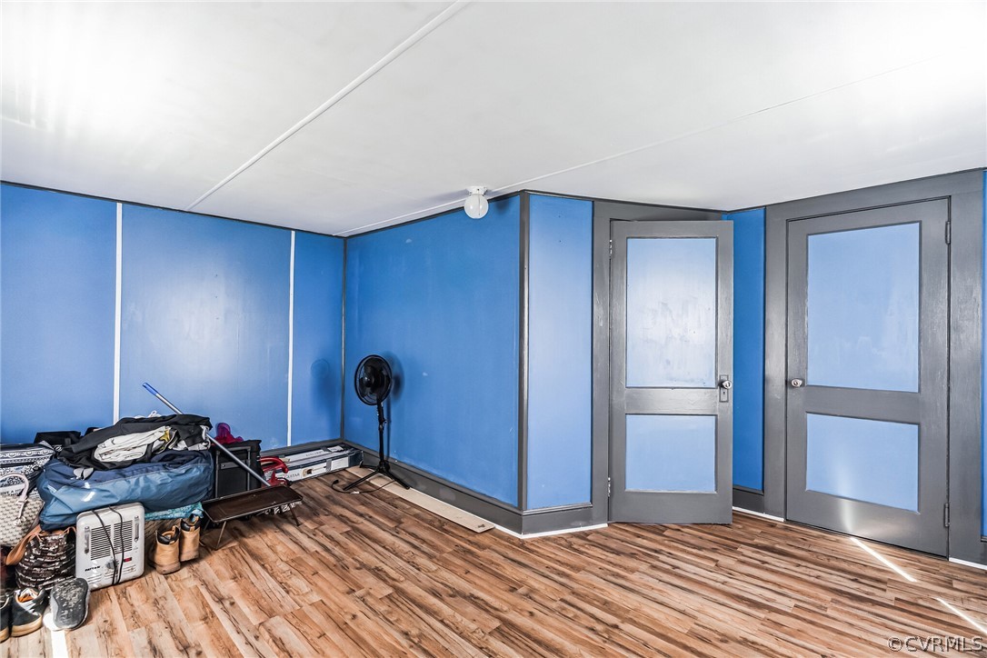 381 Moses Mill Road Chatham, VA 24531 - Photo 22 of 31 a view of empty room with wooden floor