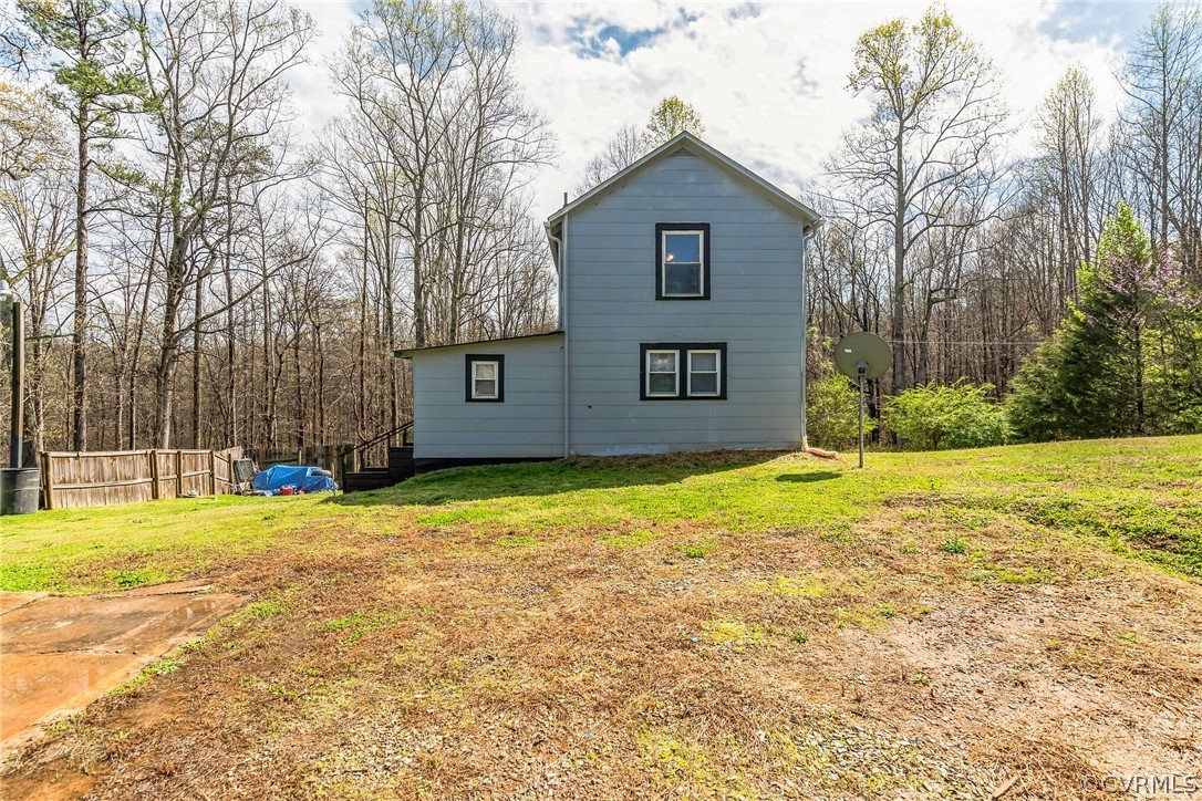 381 Moses Mill Road Chatham, VA 24531 - Photo 26 of 31 a view of a house with a yard and garage