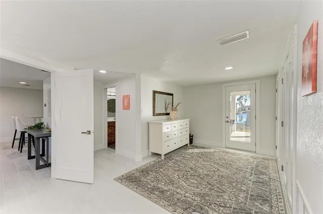 a view of a livingroom with furniture and window