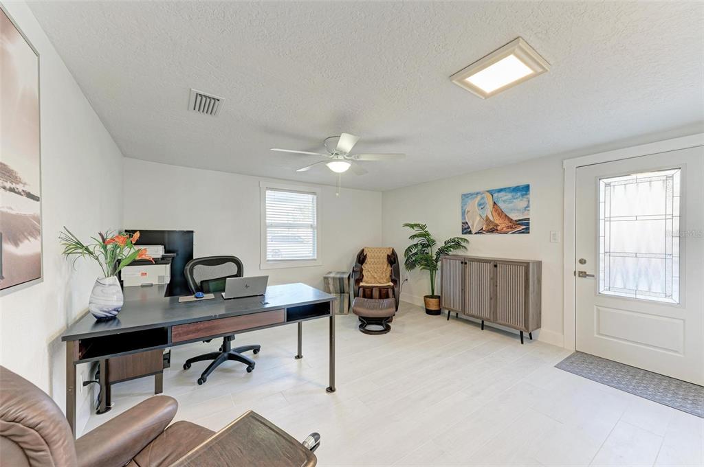 3311 Water Street Ellenton, FL 34222 - Photo 22 of 41 a view of a workspace with furniture and a window
