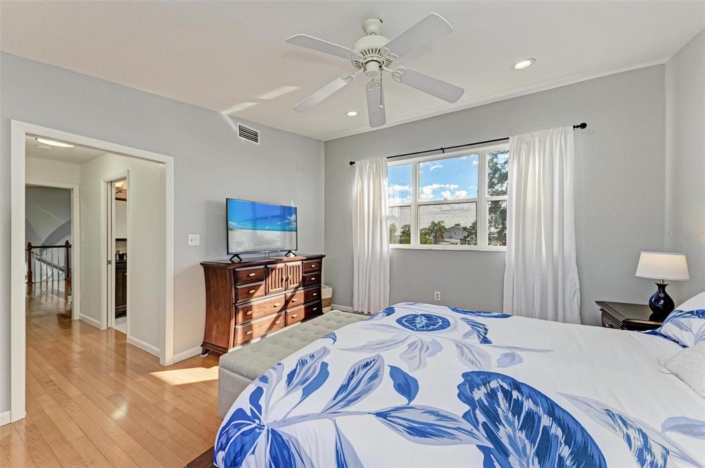 3311 Water Street Ellenton, FL 34222 - Photo 27 of 41 a bedroom with a bed and a flat screen tv