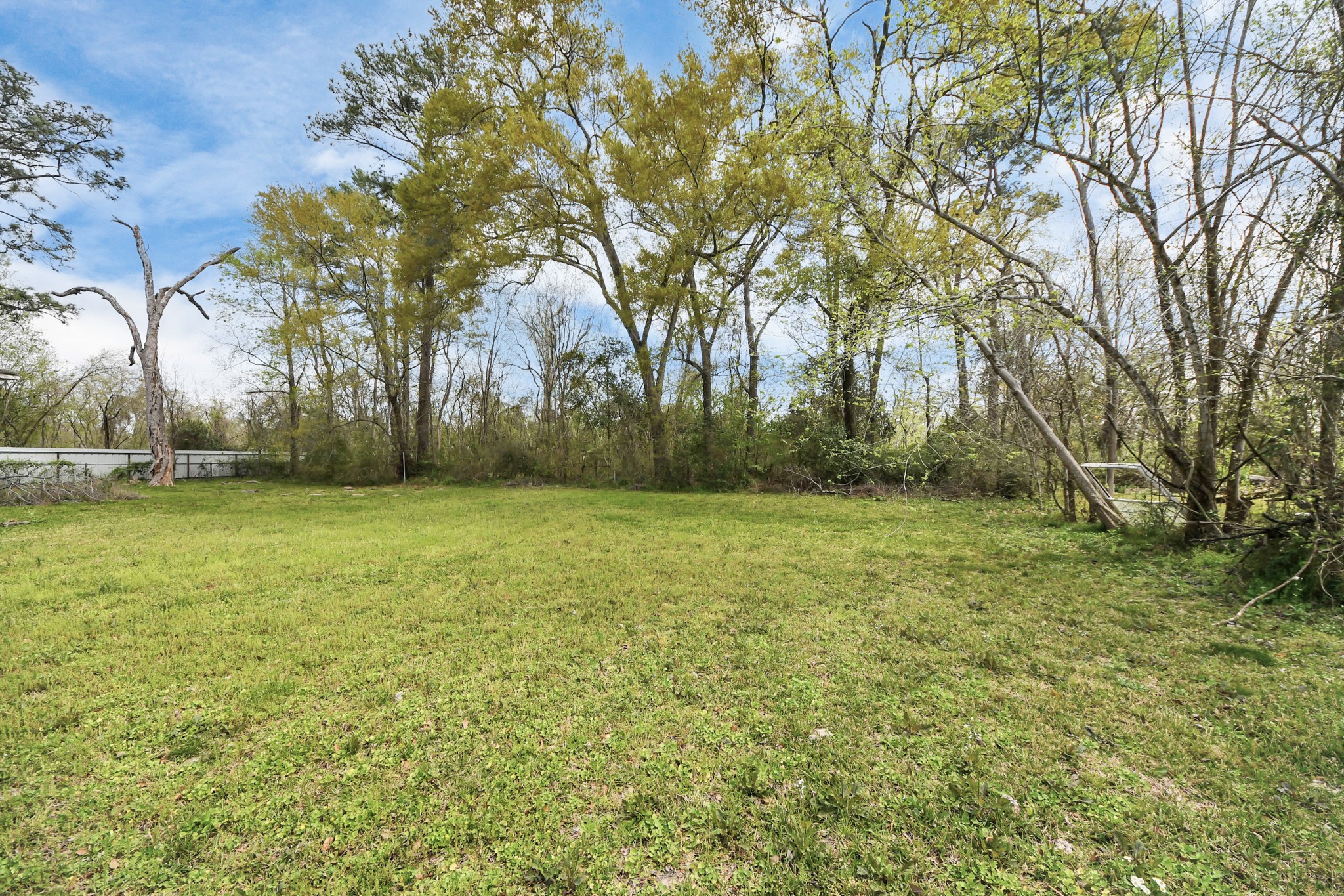 8181 Count Street Houston, TX 77028 - Photo 5 of 12 a view of outdoor space with deck and yard
