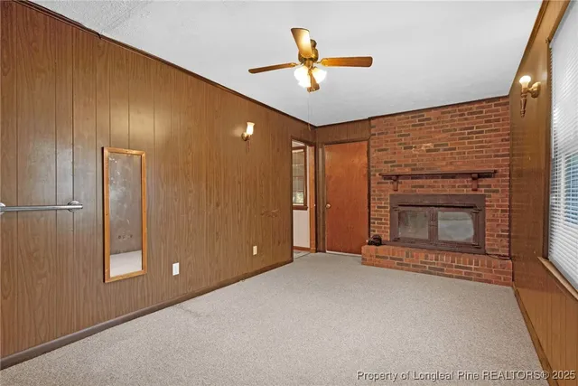 a kitchen that has a sink and a stove in it