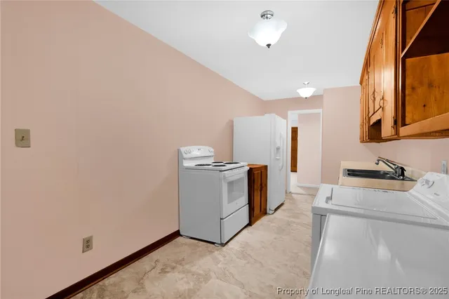 a view of a room with a window and ceiling fan